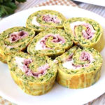 rotolo-frittata-zucchine-stracchino-prosciutto-cotto-uova-rostivendolo-StevenGY